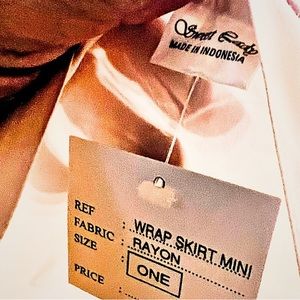 One size fits all wrap around rayon skirt. Can be used as a shawl too.